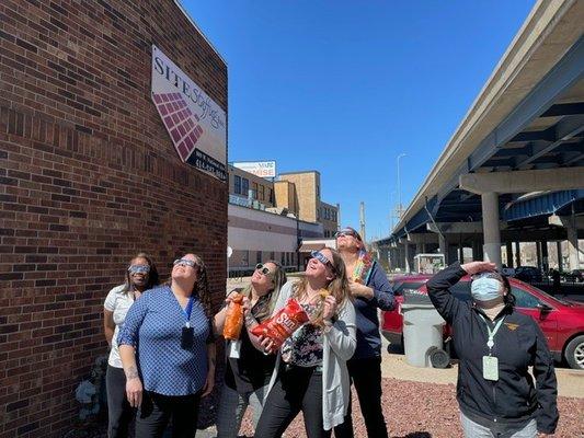 Employees enjoying the eclipse.