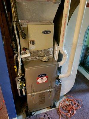 A Carrier high-efficiency gas furnace installation today in Woodlawn. The landlord received $750 in instant rebates for income properties.