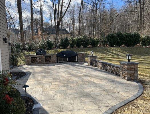 Simply stunning patio, sitting wall and outdoor kitchen by the D'Antonio Landscaping team. We highly recommend Nick and the team!