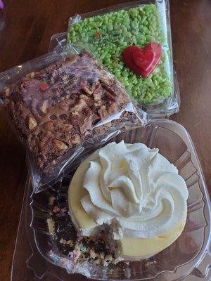 Birthday  cheesecake, chocolate chip pecan brownie, and a grinch crispy treat