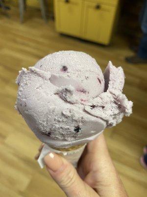 Single scoop of Buttermilk Huckleberry