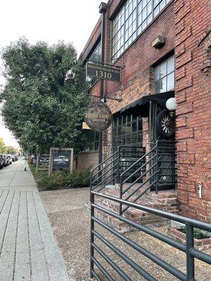 Outside of third coast comedy club with signage