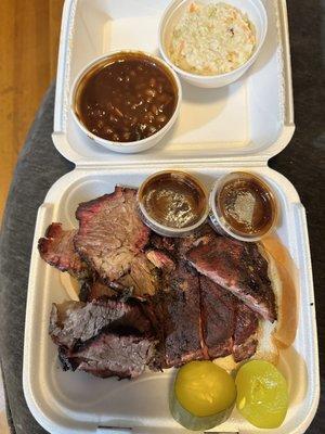 Brisket, ribs, homemade pickles,  beans, slaw