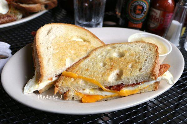 Maiden Lane ($9.25) - grilled sourdough with two fried eggs, cheddar cheese, and bacon. Subbed applesauce for hash browns