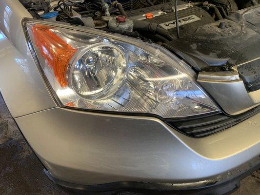 Headlight cleaning. Sanding, polishing, and buffing. looks new again.