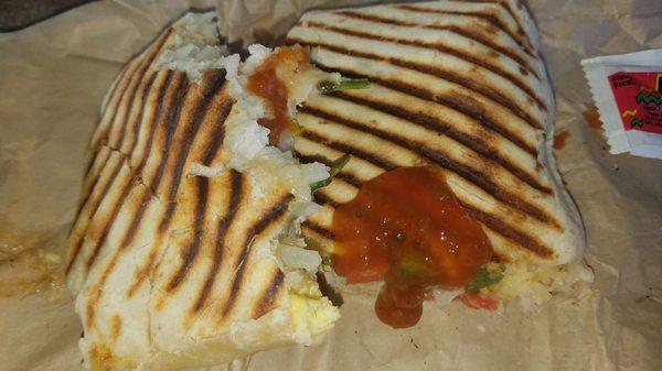 That is not a veggie burrito! It was a breakfast sandwich. I tried to spice it up... That didn't help. Major disappointment!!!