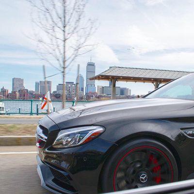 Shop Car rolling with The Boston Skyline