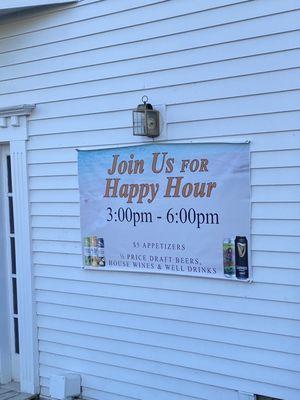 These are the advertised signs. Note none relating to patio only happy hour.