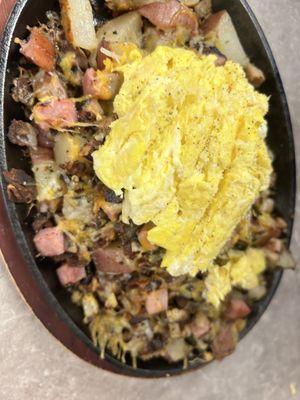 Meat trio skillet with my choice of scrambled eggs.