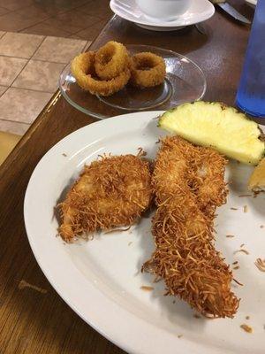 Coconut chicken, mid meal when I received my side of onion rings, consisting of 3 rings.