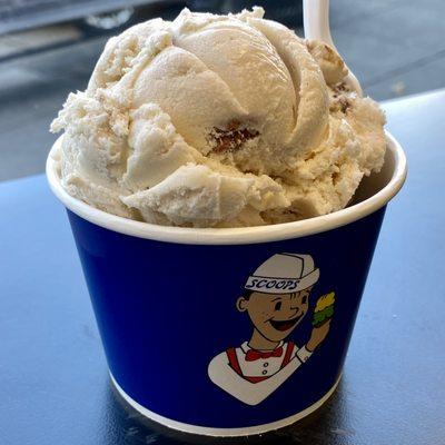 2 scoops of ice cream: butter pecan and Pittsburgh pothole