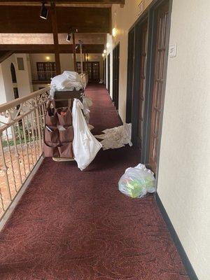 Towels and trash sitting outside rooms for days at a time