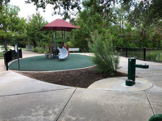 Small Playscape and water fountain