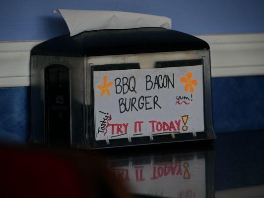 Delightful napkin dispenser messaging.