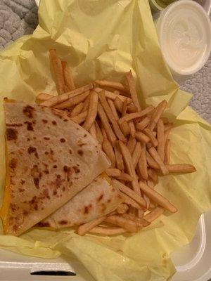 Fries look like they have been there for hours and this is the $8 quesadilla lol.