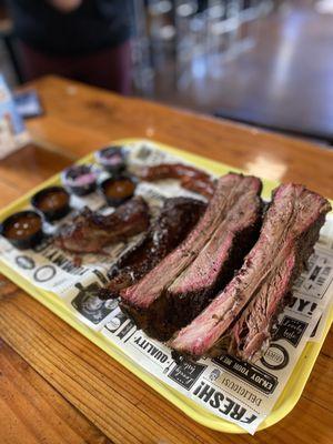 2 Dino Ribs, 2 beef back ribs, one sausage