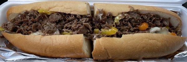 Cheesesteak Plain with hot peppers. Nice portion, fresh roll and a good cheese to meat ratio