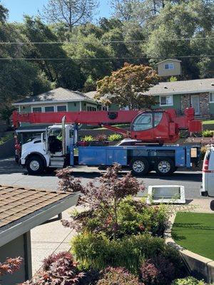 Large crane for careful removal of the old unit and installation for the new unit