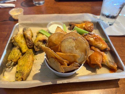 5 lemon pepper wings, homemade chips, and 5 mild buffalo wings $18.00.