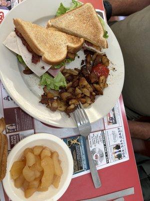 Club with homemade home fries and baked apples