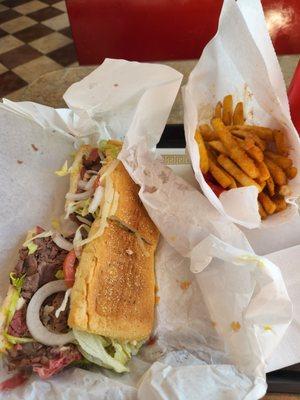 Combo sandwich with roast beef, corned beef plus garlic French  fries   BONUS  They fried the fries while I waited so they were fresh