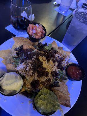 Nacho Grande with shredded chicken and guacamole