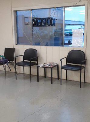 Chairs in the waiting area including up to date magazines to read.