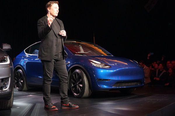 Elon and his pair of DeMarco shoes during a Tesla reveal.