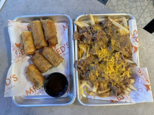 Boudin Egg Rolls and Debris Fries... both of these are LEGIT!