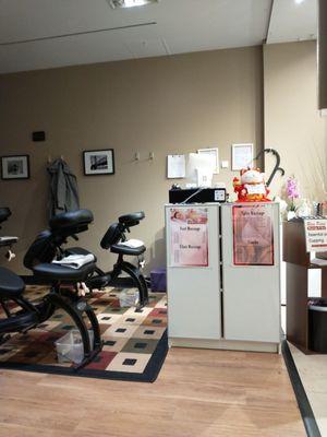 Front desk and massage chair area.