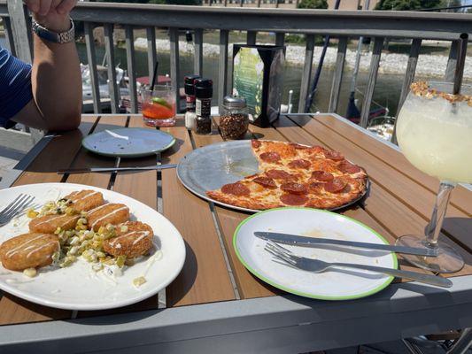 Jalapeño corn potato cakes, pepperoni pizza and coconut margarita.