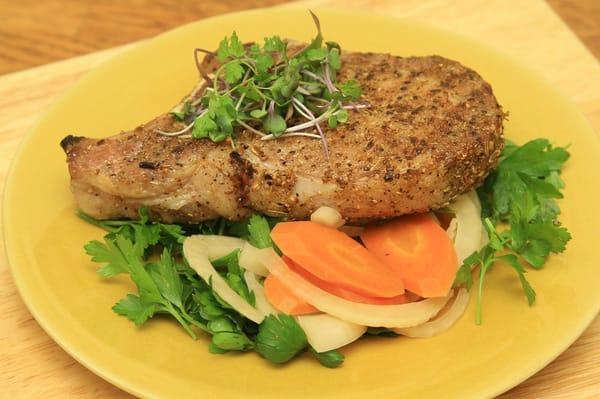 Fennel Crusted Pork Chop with pickled vegetable salad