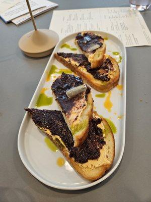 Tartine- goat cheese, fig spread, and herb oil