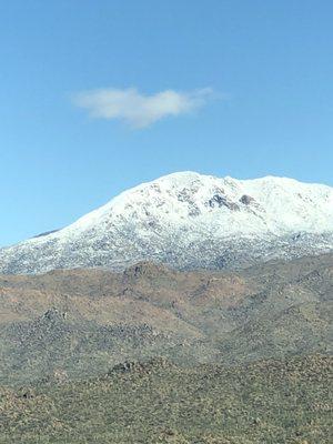 Brown sandstone and white snow