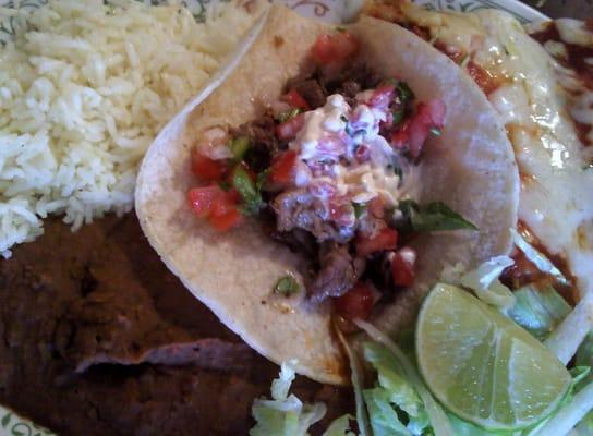 Plate of beef enchilada and taco