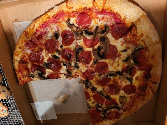 Pepperoni and mushroom pizza