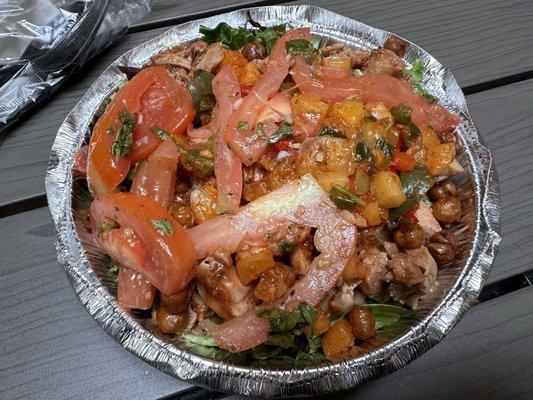 Mixed greens bowl with one protein chicken thigh, pineapple salsa, mango habanero. Thumbs up.