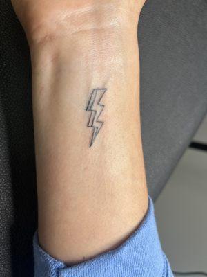 Lighting bolt done by Catie at Delicate Ink Tattoo