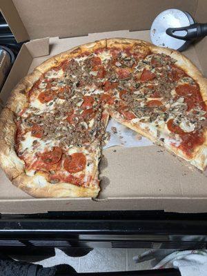 Sausage pepperoni mushroom pizza