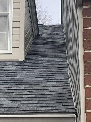 Siding damaged and lumpy shingles