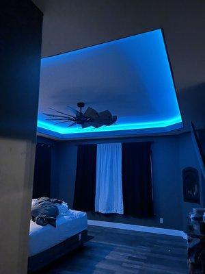 Color changing lights and ceiling fan installed in the master bedroom