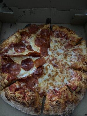 Medium pizza half pepperoni and half cheese.