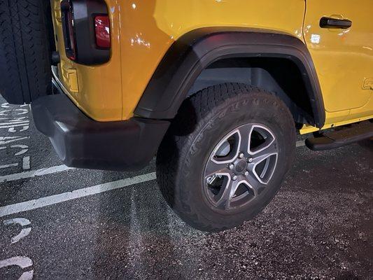 Scratched up Jeep.