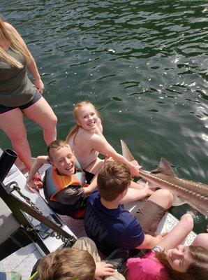 13 and under with a sturgeon