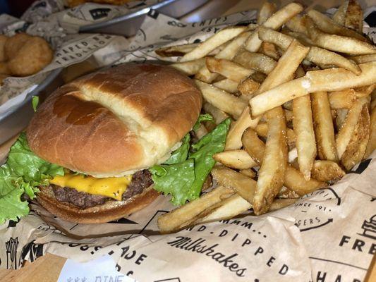 Regular cheeseburger with lettuce and fries