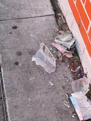 Broken Glass on Sidewalk