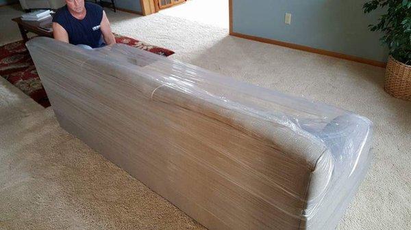 Furniture is shrink wrapped.