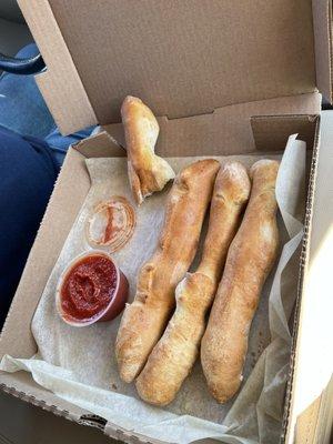 Half order of breadsticks. Someone did t wait for me to take the photo first. Lol.