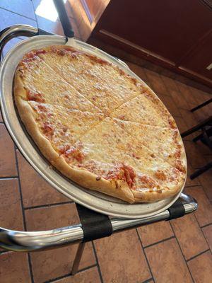 Large cheese pizza with extra cheese