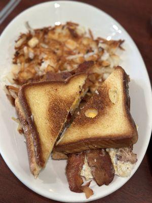 Bacon egg and cheese sandwich on Texas Toast.